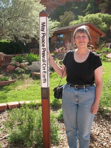 A sign post in front of the Welcome Center